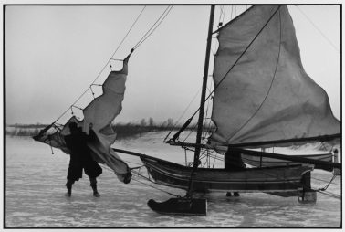 Rigging ice boat sails on the Yzer Meer Holland, 1964 by Leonard Freed