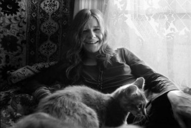 Janis Joplin with cat by Baron Wolman