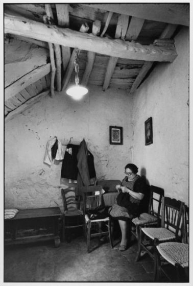 Woman sewing at home, Madonie Mountains, Sicily, Italy, 1974 by Leonard Freed