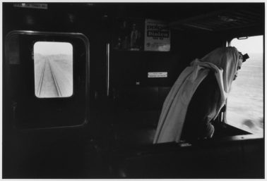 Man prays on train 1973 Israel, 1973 by Leonard Freed