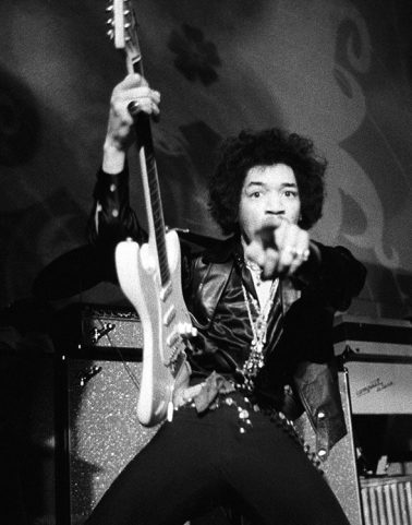 Jimi Hendrix performs at the Fillmore West, San Francisco, February 1968 by Baron Wolman