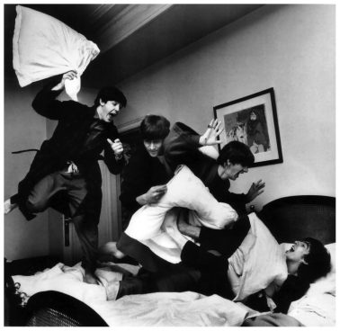 Beatles Pillow Fight, George V Hotel, Paris, 1964 by Harry Benson