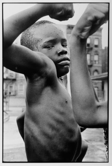 Harlem NYC Muscle Boy, 1963 by Leonard Freed