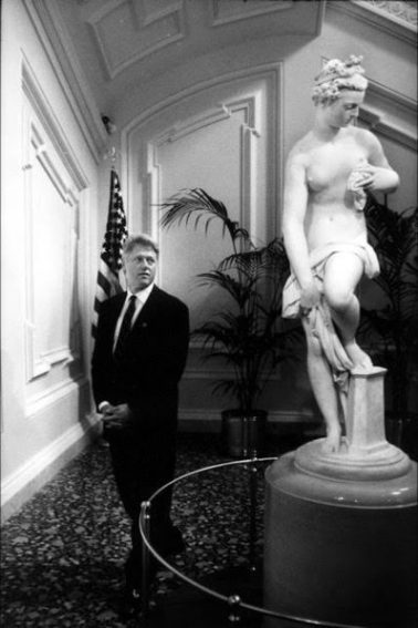 Bill Clinton and Sculpture, Lobby of US Embassy, Rome, Italy, 1990's by Robert McNeely