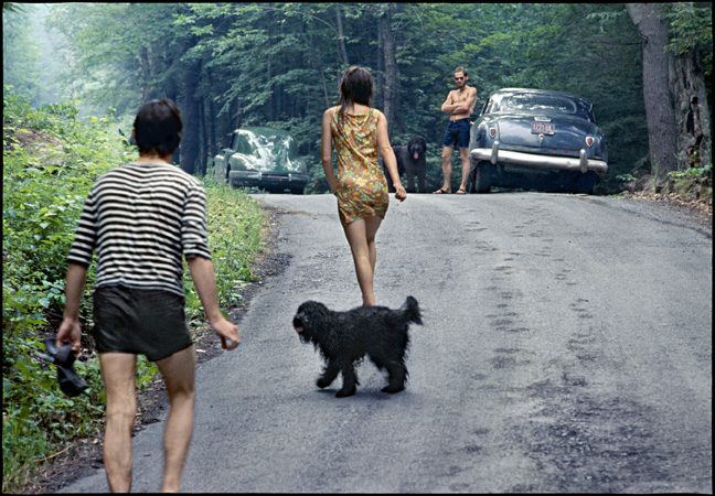 After swimmin’ at the Millstream. Rick and Grace Danko with their dog. Levon and Hamlet next to Rick’s ’49 Hudson at the top of the hill. Woodstock, NY, ’68