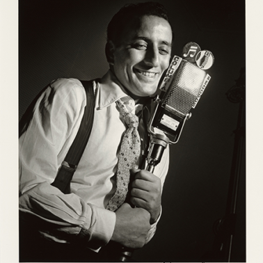 Tony Bennett at microphone - photographed by Herman Leonard